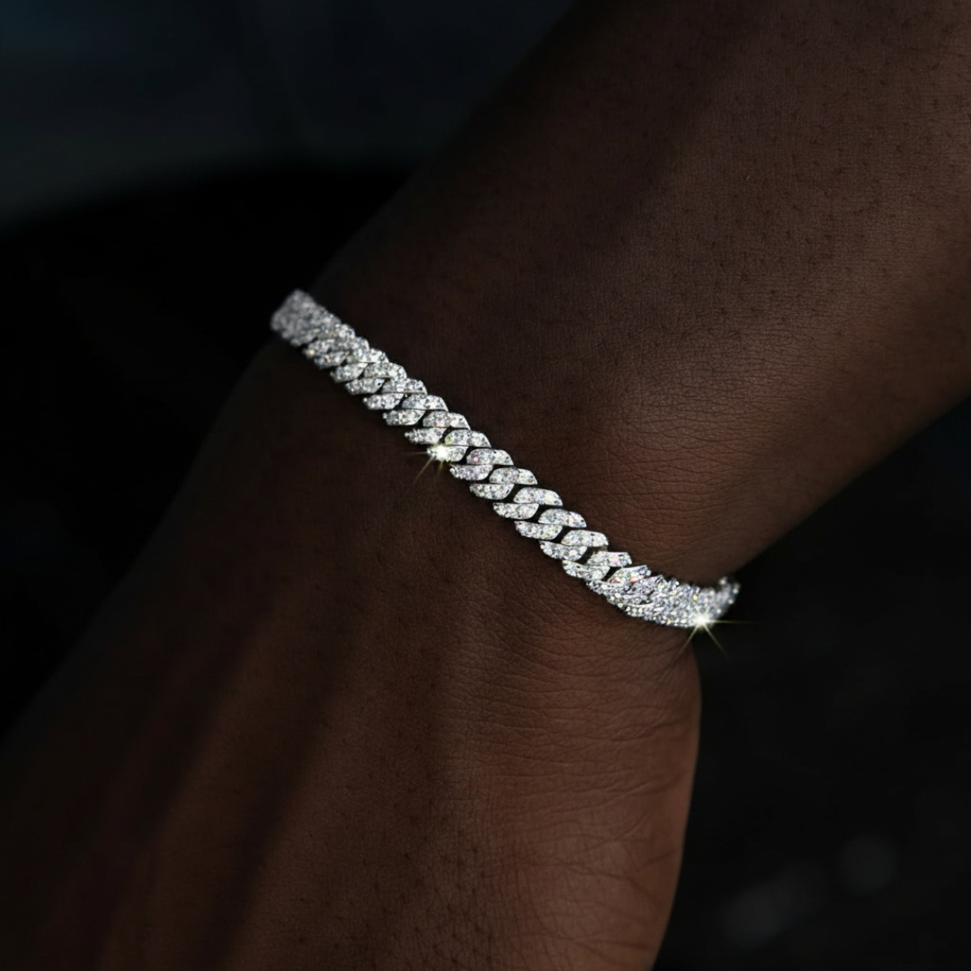 Close-up of a hand wearing ROYAL ICE VVS1 18K White Gold Cuban bracelet with sparkling Moissanites.